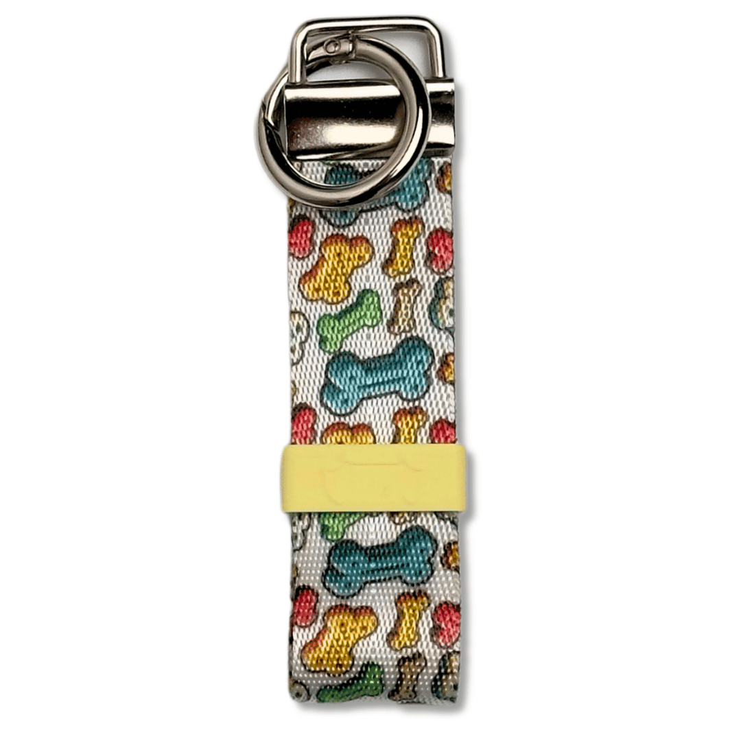 Hundekotbeutelhalter mit bunten Hundeknochen und Ring Karabiner