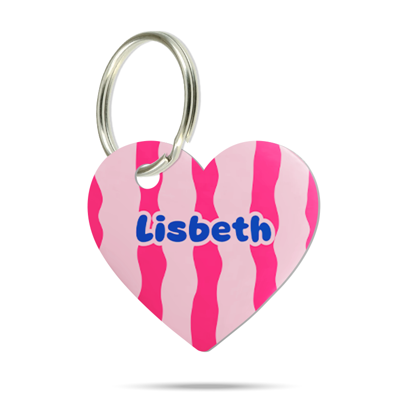 Personalisierte Hundemarke aus Acryl in Herzform mit geschwungenen rosa und pinken Streifen, Name Streusel und Metallring
